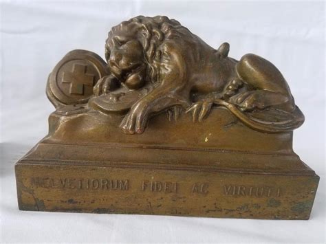 antique small metal box with helvetiorum riddle ac virtuti|Lion Of Lucerne Bookends for sale .